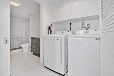 Introducing a spectacular, renovated 2BD+Den/3BA townhome at 400