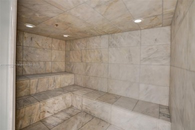 Introducing a spectacular, renovated 2BD+Den/3BA townhome at 400