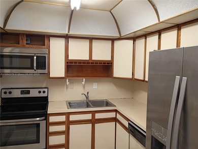 FIRST FLOOR CORNER UNIT 2 BEDROOMS 2 BATHROOMS CONDO IN WEST