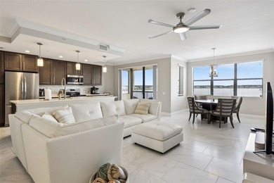Experience luxury lakefront living in this exquisite 3-bedroom