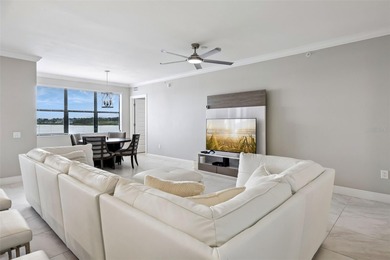 Experience luxury lakefront living in this exquisite 3-bedroom