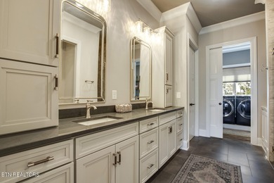 Exceptional Lakefront Living in WindRiver Golf & Country Club