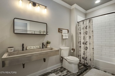 Exceptional Lakefront Living in WindRiver Golf & Country Club