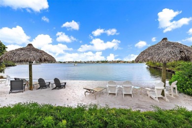 Welcome to your coastal retreat in the sought-after Mariners Cay