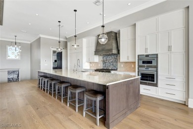 Welcome to 26906 McLaughlin Blvd, a modern coastal masterpiece