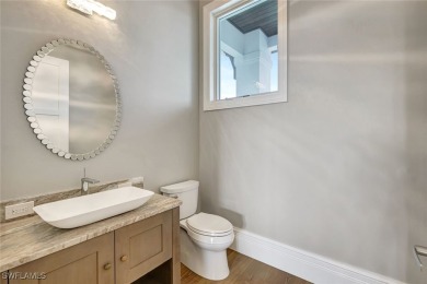 Welcome to 26906 McLaughlin Blvd, a modern coastal masterpiece