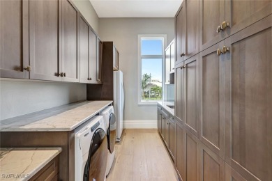 Welcome to 26906 McLaughlin Blvd, a modern coastal masterpiece