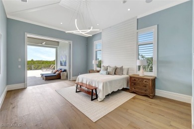 Welcome to 26906 McLaughlin Blvd, a modern coastal masterpiece