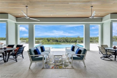 Welcome to 26906 McLaughlin Blvd, a modern coastal masterpiece