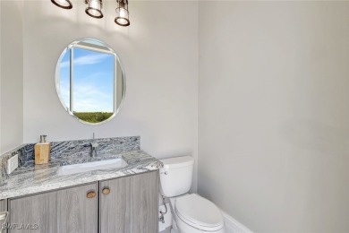 Welcome to 26906 McLaughlin Blvd, a modern coastal masterpiece