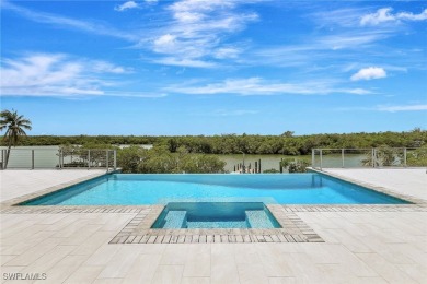 Welcome to 26906 McLaughlin Blvd, a modern coastal masterpiece