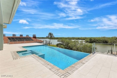 Welcome to 26906 McLaughlin Blvd, a modern coastal masterpiece