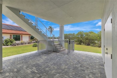 Welcome to 26906 McLaughlin Blvd, a modern coastal masterpiece