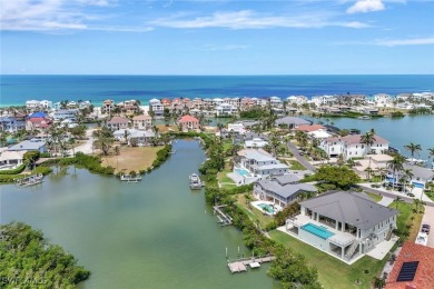 Welcome to 26906 McLaughlin Blvd, a modern coastal masterpiece