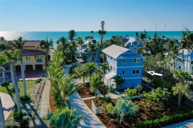 Rare Beachfront Estate with Separate Guest Home on Captiva