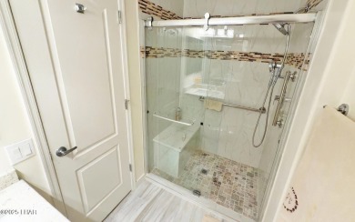 This luxurious top-floor Lake View condo offers breathtaking