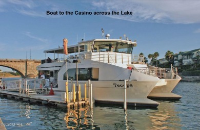 This luxurious top-floor Lake View condo offers breathtaking