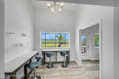 Welcome to 4070 South Tropical Trail... a rare waterfront