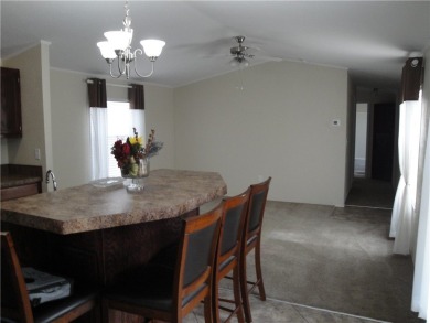 A lovely home just across the street from the lake situated on