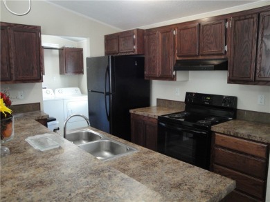 A lovely home just across the street from the lake situated on