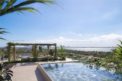 Rising from the most peaceful and expansive stretch of sand on