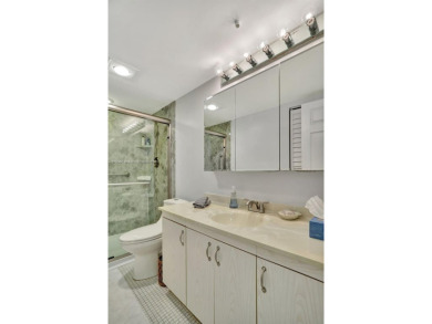 Welcome home to this desirable ground floor condo in one of the