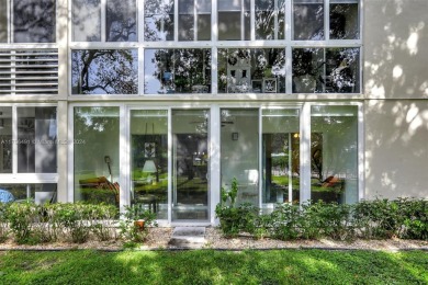 Welcome home to this desirable ground floor condo in one of the