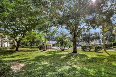 Welcome home to this desirable ground floor condo in one of the