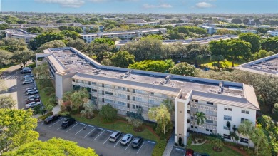 Welcome home to this desirable ground floor condo in one of the