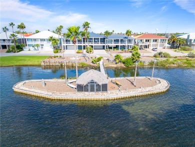 This extraordinary waterfront estate spans over 4,300 sq. ft. of