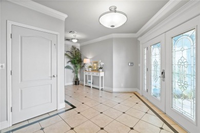 This extraordinary waterfront estate spans over 4,300 sq. ft. of