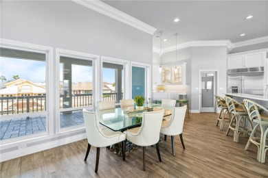 This extraordinary waterfront estate spans over 4,300 sq. ft. of