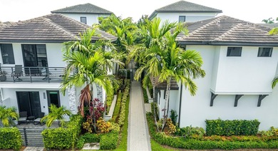 Discover LUXURY living in the heart of DOWNTOWN DORAL w/this