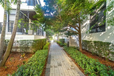 Discover LUXURY living in the heart of DOWNTOWN DORAL w/this