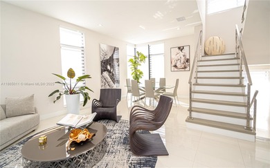 Discover LUXURY living in the heart of DOWNTOWN DORAL w/this