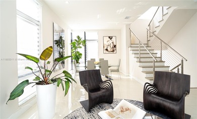 Discover LUXURY living in the heart of DOWNTOWN DORAL w/this