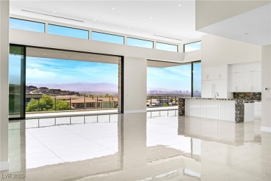 Welcome to 641 Majestic Rim Drive, a modern sanctuary of