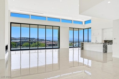 Welcome to 641 Majestic Rim Drive, a modern sanctuary of