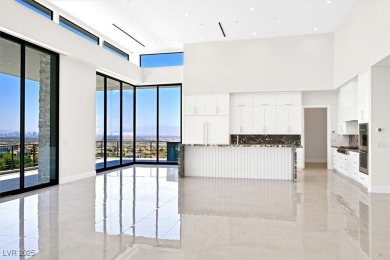 Welcome to 641 Majestic Rim Drive, a modern sanctuary of