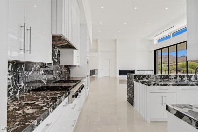 Welcome to 641 Majestic Rim Drive, a modern sanctuary of