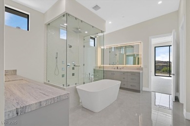 Welcome to 641 Majestic Rim Drive, a modern sanctuary of