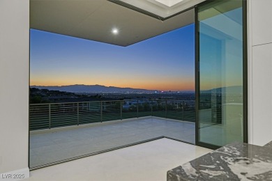 Welcome to 641 Majestic Rim Drive, a modern sanctuary of