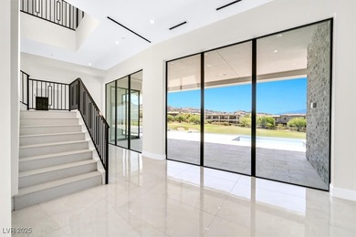 Welcome to 641 Majestic Rim Drive, a modern sanctuary of