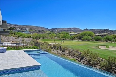 Welcome to 641 Majestic Rim Drive, a modern sanctuary of