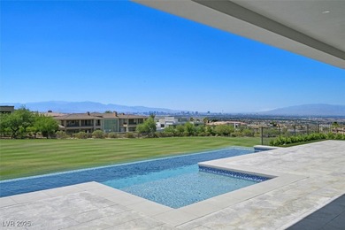 Welcome to 641 Majestic Rim Drive, a modern sanctuary of