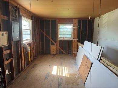 Check out this spacious starter home or maybe a possible