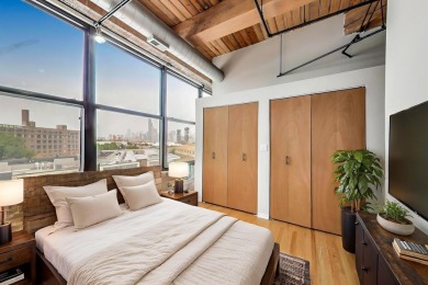 Step into a dramatic timber-loft masterpiece featuring 13-foot