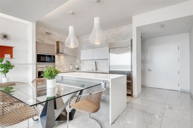 SPECTACULAR UNIT WITH DIRECT BAY VIEWS OF BISCAYNE BAY. 2 BED, 2