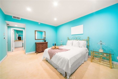 Perched on the top floor with soaring vaulted ceilings and