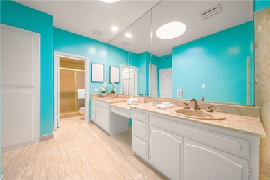 Perched on the top floor with soaring vaulted ceilings and